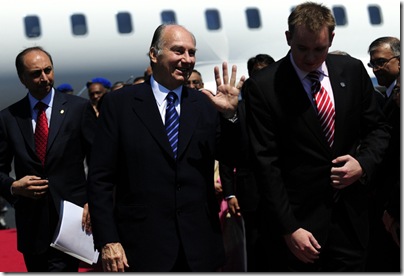 The Aga Khan, head of the world's 15 million Ismaili Muslims, arrives at Fulton County Airport on Thursday.