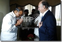 Imam (spirtual leader) of the Shia Imami Ismaili muslims, the Aga Khan (R) greets with the Chief Minister of Andhra Pradesh Rajashekar Reddy 