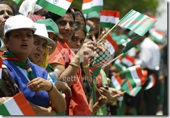 Members of the Shia Imami Ismaili Muslim community, wait to greet the Imam 