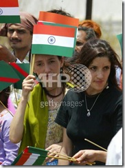 Members of the Shia Imami Ismaili Muslim community, wait to greet the Imam 