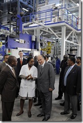 His Highness the Aga Khan reviewing new extrusion machinery at the polyethylene plant at Filtisac.