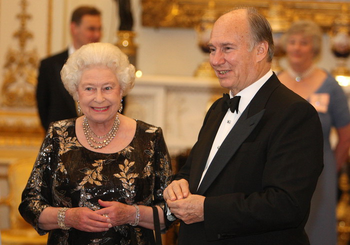 Britain's Queen Elizabeth II and The Aga Khan share a smile at a dinner at Buckingham Palace, London, to mark the Aga Khan's Golden Jubilee, Monday July 7, 2008. The Aga Khan is the Imam of the world's 15 million Shia Ismaili Muslims and a direct descendant of the Prophet Muhammad.Last year he celebrated the 50th anniversary of his succession to the title held by his grandfather.The Aga Khan is coming to the end of a seven-day visit to the United Kingdom held to mark the milestone. (AP Photo/PA, Dominic Lipinski)