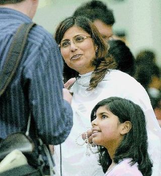 Parin Somani and her family flew from London to see her `spiritual and physical uplifter` during his two-day visit to B.C. Photograph by Arlen Redekop, The Province