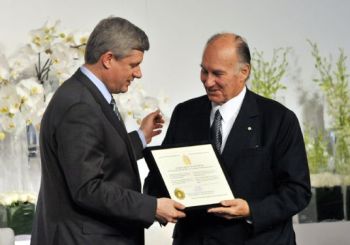 Toronto, Canada. May 28, 2010: His Highness Prince Karim Aga Khan IV receives a certificate of Honorary Canadian Citizenship from Prime Minister Harper, during the Foundation Ceremony of the Aga Khan Museum, the Ismaili Centre Toronto and the Aga Khan Park. Image credit: Moez Visram via The Ismaili