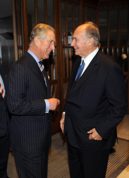 The Prince of Wales is greeted by the Aga Khan