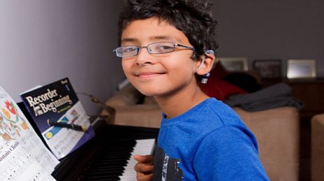 Adam Kassam: Profoundly deaf eight-year-old from Swiss Cottage wins piano funding