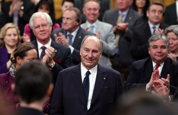 The Aga Khan, spiritual leader of the world's 15-million Shia Ismaili Muslims, receives a standing ovation from the House of Commons, on Parliament Hill in Ottawa, Thursday February 27, 2014. THE CANADIAN PRESS/Fred Chartrand