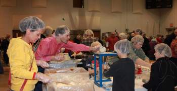Ismaili Jamatkhana Naperville, Churches join forces to pack 1 millionth meal | The Naperville Sun