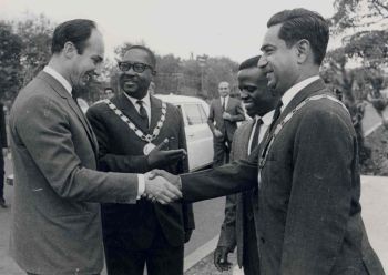 His Highness the Aga Khan, left, being introduced to the former Mayor of Moshi Mohamedali Natha Hirji.