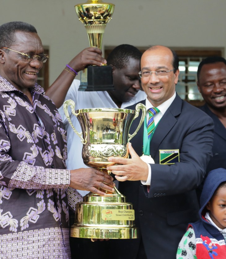 Hon. Prime Minister of Tanzania and Altaf Hirani, holding the Street Child World Cup 2014 Trophy