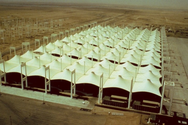 The Hajj Terminal is a tented structure that covers 120 acres and 2.8 million square feet and accommodates massive groups from all over the world in a short timeframe It received the 2010 American Institute of Architects (AIA) Twenty-Five Year award. The AIA Twenty-five Year Award recognizes an architectural project that has stood the test of time ( 25 years). The space serves as a gateway for millions of pilgrims who journey to the holy city of Mecca each year. (Fabric Architecture / Fabric Structures).