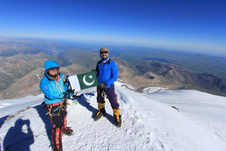On top of Mount Elbrus, highest mountain in Russia (Europe)! We carried and hoisted the Green flag on top of every continent ... being first.