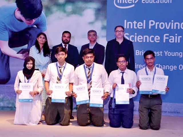 Aga Khan Higher Secondary School Student Excel. One of the groups at the science fair holding their certificates. PHOTO: COURTESY INTEL