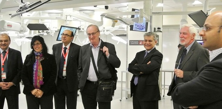Aga Khan University representatives visit the Cumming School of Medicine simulation lab. From left: Salim Hasham, Farzana Karim-Haji, Aziz Jan, Keith Cash, Farhat Abbas, Lee Hilling and Khalil Shariff. Photo by Daniela Andrei, University of Calgary International