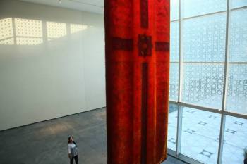 Aisha Khalid next to "Your Way Begins on the Other Side"