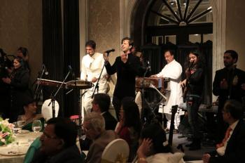 India, 2013 - At the institutional banquet, musicians Salim and Sulaiman, accompanied by six youth from across India, perform before the Imam and the Jamati leadership (Photo: The Ismaili/Nazim Lokhandwala)
