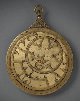 This astrolabe may have been made in Toledo, Spain, then a major centre of scientific translation. The inscriptions on the astrolabe bear the names of constellations in both Arabic and Latin, with additional inscriptions in Arabic. Later, Hebrew was added to one of the plates. Muslim scientists worked together with Christian and Jewish counterparts to translate and transmit scientific knowledge to Europe. (image Aga Khan Museum)