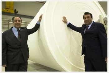 Amin, left, and his brother Shiraz Tejani, at their LPC paper factory in Hamilton, Leicester in 2003