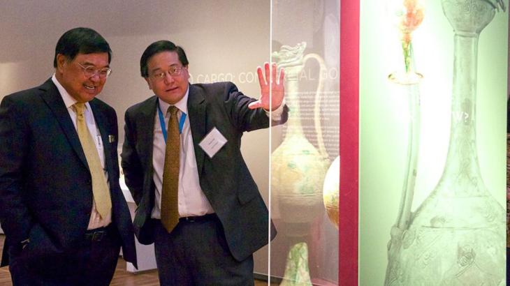 The High Commissioner of Singapore getting an exclusive tour of the Last Dhow exhibition featured at the Aga Khan Museum for a limited time . The High Commissioner of Singapore (l) is seen here with Dr Henry Kim (r), Director and CEO of the museum.