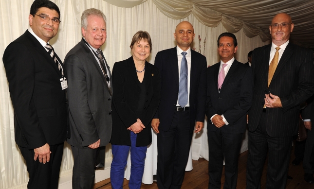 MPs Angie Bray, Eric Ollerenshaw and Secretary of State Sajid Javid, with Ismaili Council President Amin Mawji and other Jamati leaders at the Houses of Parliament Navroz reception. (Image credit: Riaz Kassam via TheIsmaili.com)