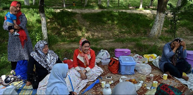an AAfghan family gather for a picnic in the Bagh-e-Babur Gardens in Kabul. (AFP)