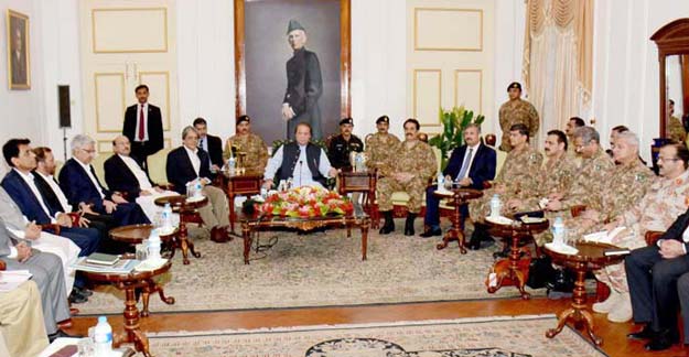 Prime Minister Nawaz Sharif chairing a high level security meeting at Governor House in Karachi. (PHOTO: PID via The Express Tribune)