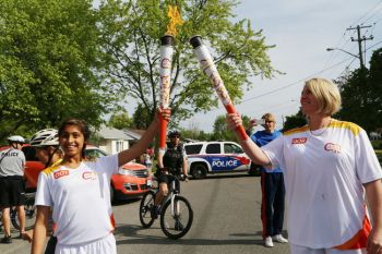 Maheen Awadia participates in 2015 Pan Am Games Torch Relay in Toronto