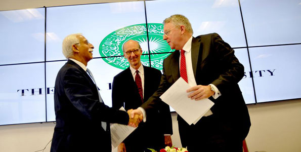 Aga Khan University, DW sign training pact
