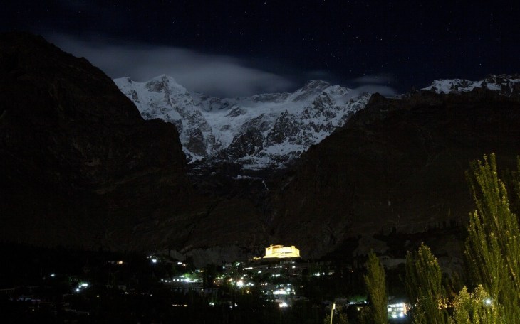 A night view of the Hunza Valley. The Ultar Peak in the Karakoram mountain range in Pakistan is also seen over the Baltit Fort in Hunza on June 27. (Image credit: Mian Khursheed For The Washington Post)