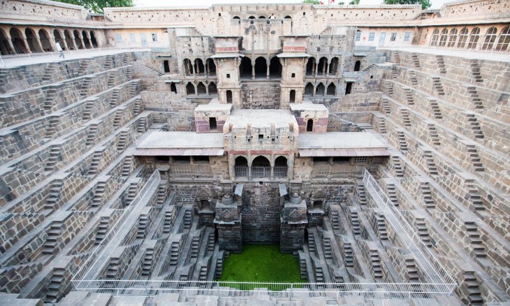 The Chand baoli near Jaipur extends almost 100ft into the ground, making it one of the deepest and largest stepwells in India. (Photograph: dbimages/Alamy via The Guardian)