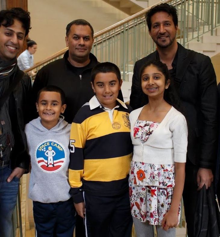 Back, Left to Right: Salim Merchant, Azeem Maherali, Sulaiman Merchant, and Professor Ali Asani. Front, Left to Right: Excited young fans: brothers Riyaan and Qayl Maherali; and Alyna Nanji. (Image credit: Anvar Nanji Copyright)