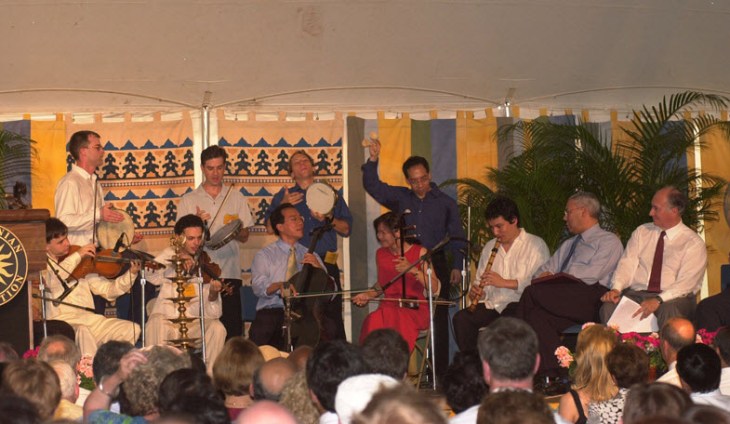 Yo-Yo Ma and members of the Silk Road Ensemble performing at the opening ceremony of the Smithsonian Folklife Festival in 2002. Former U.S. Secretary of State Colin Powell and Mawlana Hazar Imam are seated at right. (Photo: AKDN/Zahur Ramji)