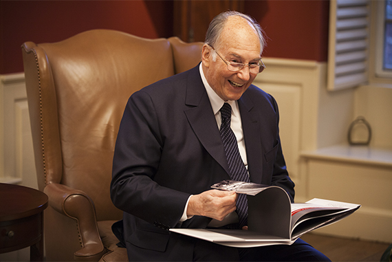 The Aga Khan meets with Harvard President Drew Faust in her Massachusetts Hall office at Harvard University. The Aga Khan is pictured looking at a photo book during his visit. Stephanie Mitchell/Harvard Staff Photographer