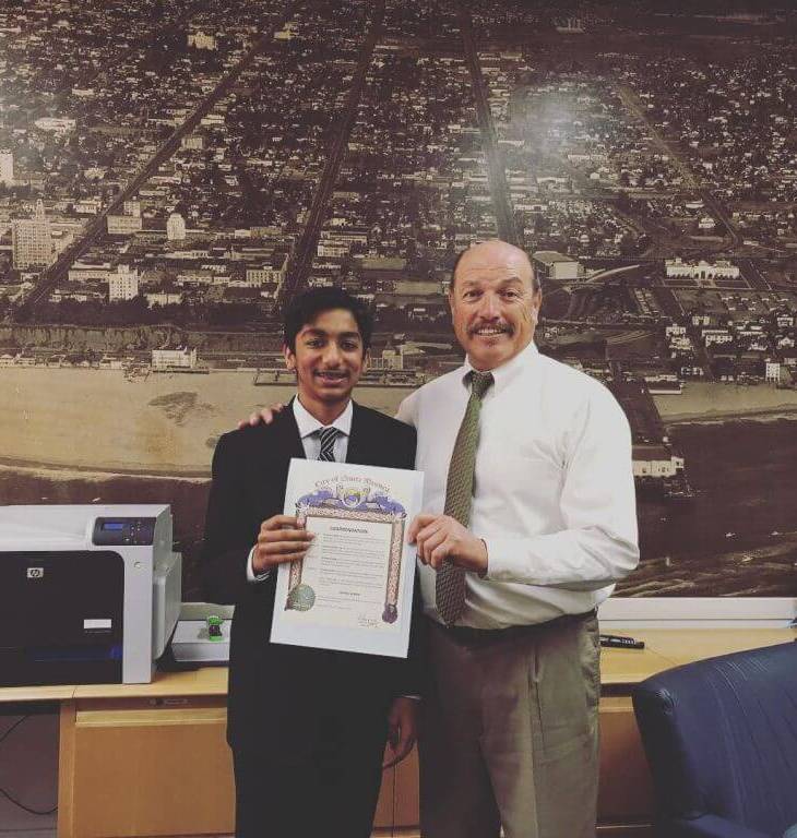 Mayor Tony Vazquez, City of Santa Monica, presents Certificate of Commendation to Danial Asaria