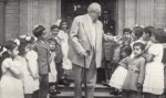 Ismaili children greet Imam Sultan Mahomed Shah during his visit to Ismaili Centre at Palace Gate, London, UK, on July 19, 1953 (Photo: Ilm, Centenary Issue)