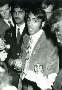 Ashak and his brother Shiraz (left) being interviewed by the Australian press in 1972 upon arrival in Sydney, as one of the first Ugandan nationals forced to leave by the Idi Amin regime.