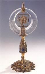 Rock crystal ornament inscribed with the name of Fatimid Caliph Imam al-Zahir (r.1021-1036), 14th century European mount. Nuremberg, Germanisches Museum.