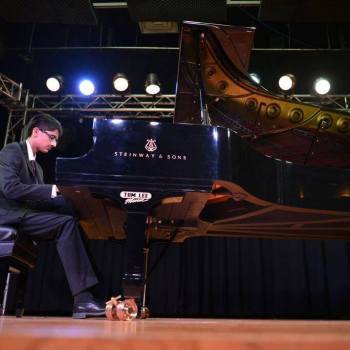 Student Aman Jina performs on piano at Ehrbar Hall, Vienna, and Carnegie Hall, NY