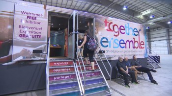 Aga Khan Foundation's Bus exhibit raising awareness on global issues rolls into Regina - Saskatoon - CBC News