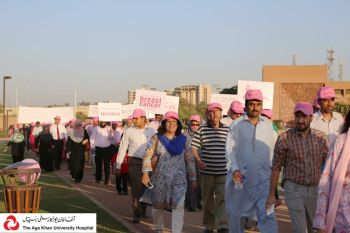 Breast cancer most common cancer among Pakistani women: Clad in pink, men and women walk for breast cancer awareness at the Aga Khan University Hospital, Karachi, Pakistan