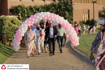Breast cancer most common cancer among Pakistani women: Clad in pink, men and women walk for breast cancer awareness at the Aga Khan University Hospital, Karachi, Pakistan