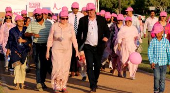 Breast cancer most common cancer among Pakistani women: Clad in pink, men and women walk for breast cancer awareness at the Aga Khan University Hospital, Karachi, Pakistan