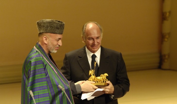 From the Ismailimail archives. Berlin, Germany, 3 October 2005: President Hamid Karzai of the Islamic Republic of Afghanistan presents the "United we Care" award to His Highness Prince Karim Aga Khan. The Die Quadriga awards are presented every year on the day of German Unification. (Image credit: AKDN/Gary Otte)