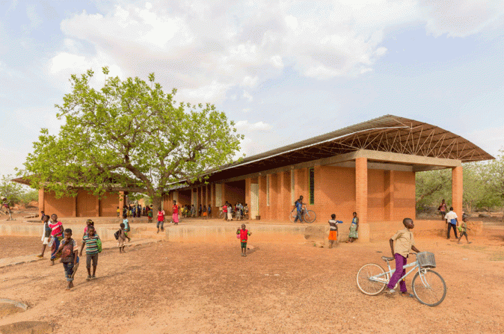 Combining skills <br> The interdisciplinary opera village project in Burkina Faso was the vision of performance artist and director Christoph Schlingensief before he died of cancer in 2010. Kéré built the intercultural center near the capital city of Ouagadougou. Pictured is the school of the Opera House at Ouagadougou. The construction combines German engineering with African handicraft. Kéré studied architecture in Berlin.(Image credit: Daniel Schwartz, Gran Horizonte Medi)