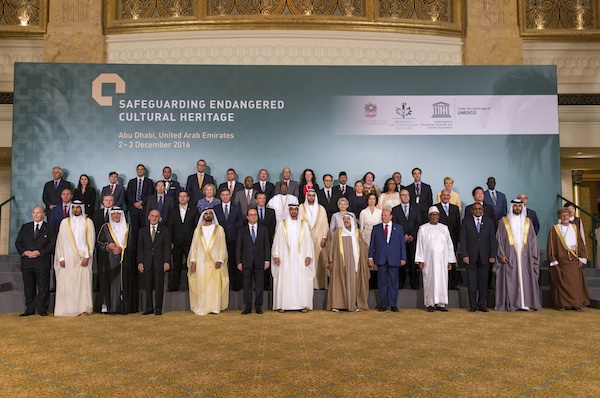 His Highness Prince Karim Aga Khan (1st down left) and French President Francois Hollande (6th down left), pose for a photo between Sheikh Mohammed bin Zayed al-Nahyan, Crown Prince of Abu Dhabi and UAE's deputy commander-in-chief of the armed forces, on his right, and Sheikh Mohammed bin Rashid al-Maktoum, UAE prime minister and ruler of Dubai with the other head of states and dignitaries during the Safeguarding Endangered Cultural Heritage Conference at Emirates Palace in Abu Dhabi, United Arab Emirates. (Image credit: Emirates News Agency via AP)