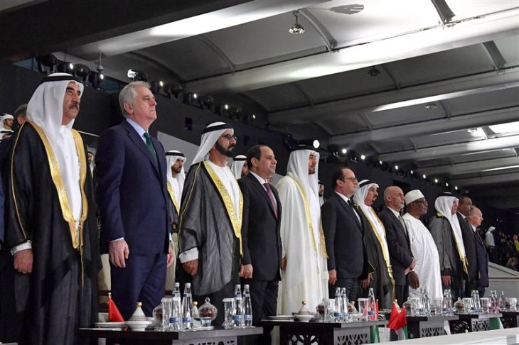 His Highness Prince Karim Aga Khan (1st right in navy blue suit) with UAE's ruling leadership, head of states and dignitaries from 40 countries during the 45th UAE National Day celebration (Image credit: Government of Dubai)