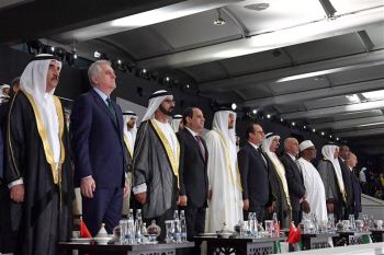His Highness Prince Karim Aga Khan (1st right in navy blue suit) with UAE's ruling leadership, head of states and dignitaries from 40 countries during the 45th UAE National Day celebration (Image credit: Government of Dubai)