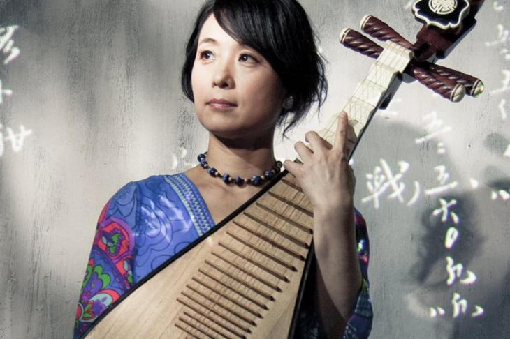 Wu Mann in the Aga Khan Music initiative London concert titled “Old and New Music from the Ends of the Silk Route” (image credit: Evening Standard)