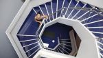 Yoga instructor YuMee Chung ready to demonstrate the 'Upward Spiral' yoga pose inspired by the twirling hexagonal staircase at the Aga Khan Museum. (Image credit: Anne-Marie Jackson via Toronto Star)