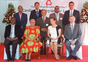 First Lady Margaret Kenyatta, cuts the ribbon to officially unveil the first Cath Lab in the Coast Region in the presence of Princess Zahra Aga Khan and staff from the Aga Khan Hospital Mombasa.